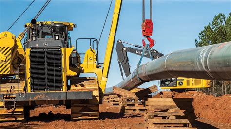 john deere pipe laying machinery